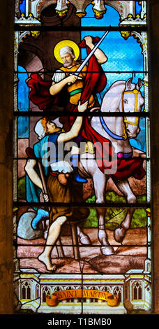 Glasmalereien in der Kirche von St. Severin, Latin, Paris, Frankreich, Darstellung der hl. Martin von Tours, ein Stück Mantel mit einem Bettler Stockfoto