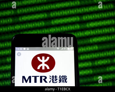 In der Ukraine. 24 Mär, 2019. In diesem Foto Illustration einer MTR Corporation logo gesehen auf einem Smartphone angezeigt. Quelle: Igor Golovniov/SOPA Images/ZUMA Draht/Alamy leben Nachrichten Stockfoto