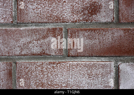 Dunkel Rot/Braun Mauer. Textur der Außenwand eines Gebäudes. Dieses Foto zeigt die schöne architektonische Details der Oberfläche. Stockfoto