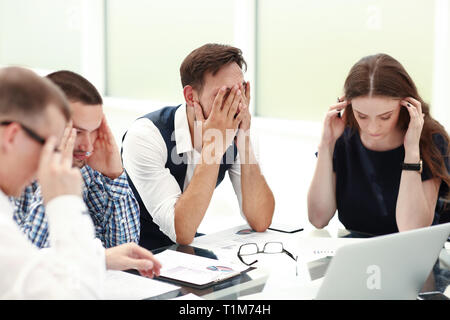 Business Team ueber finanzielle Probleme einer neuen Anlauf Stockfoto