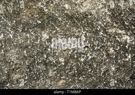 Verwitterten alten Naturstein Fläche außerhalb Stockfoto
