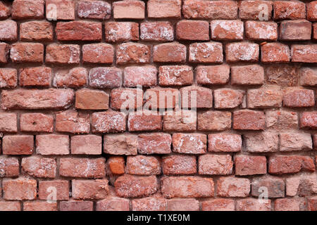 Red brick wall Textur. Alte Fassade der industriellen Gebäude, vintage Hintergrund Stockfoto