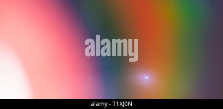Farbenfrohe abstrakte Hintergrund. Regenbogen auf CD. Stockfoto