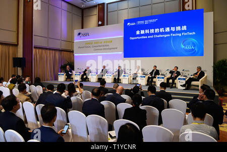 Boao, China Hainan Provinz. 29 Mär, 2019. Menschen nehmen an der Sitzung der "Chancen und Herausforderungen FinTech' während des Boao Forum für Asien Jahreskonferenz in Boao, South China Hainan Provinz, 29. März 2019. Credit: Yang Guanyu/Xinhua/Alamy leben Nachrichten Stockfoto