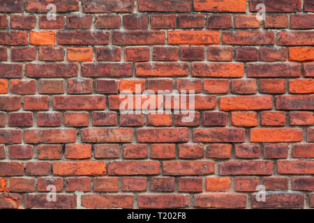 Verwitterte außen Red brick wall Hintergrund Stockfoto