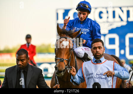 Dubai, VAE. Am 30. März 2019. Kreuz entgegen geritten von Jockey William Buick gewinnt die Dubai Gold Cup in Meydan. Die Godolphin besessen Pferd ist von Charlie Appleby Credit: Feroz Khan/Alamy Live News Credit: Feroz Khan/Alamy Leben Nachrichten geschult Stockfoto