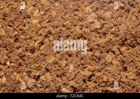 Extreme Makroaufnahme eines Scheiben Vollkornbrot mit Samen. Stockfoto