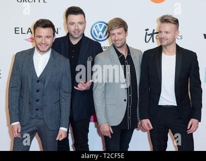 Berlin, Deutschland. 30 Mär, 2019. Musikband WESTLIFE Roter Teppich für die Verleihung der Goldenen Kamera 2019 in Berlin, Deutschland am 30.03.2019. | Verwendung der weltweiten Kredit: dpa/Alamy leben Nachrichten Stockfoto