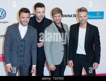 Berlin, Deutschland. 30 Mär, 2019. Musikband WESTLIFE Roter Teppich für die Verleihung der Goldenen Kamera 2019 in Berlin, Deutschland am 30.03.2019. | Verwendung der weltweiten Kredit: dpa/Alamy leben Nachrichten Stockfoto