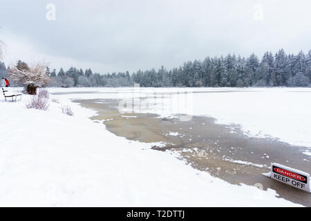 Gefrorenen See Lost Lagoon im Stanley Park, Vancouver, BC, Kanada. Stockfoto