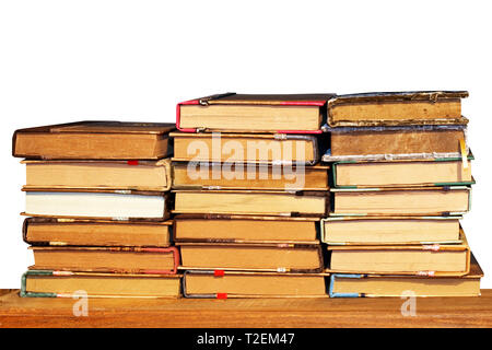 Haufen Bücher isoliert auf weißem Stockfoto
