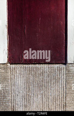 Hintergrund Mit mit braunem Holz, Backstein und weißen Brettern gemischt. Andere Textur von Zement und Holz mit einer Kirsche - Farbe. Stockfoto