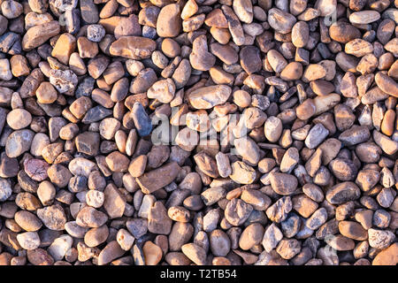 Abgerundet Stein auf den Boden, guten Hintergrund und Tapeten, Textur. Stockfoto