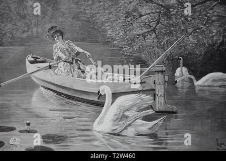 Ein Schwan verfolgt eine elegante Dame in ein ruder Boot sitzt und hat Seerosen abgeholt, Ein Schwan verfolgt eine elegante Dame sterben in einem Ruderboot sitzt und Seerosen gepflückt hat Stockfoto