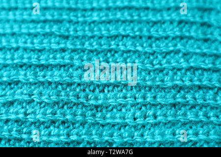 Geschlossen bis Textur von Türkis Blau Alpaka gestrickte Wolle Stoff in horizontalen Muster Stockfoto