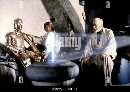 ANTHONY DANIELS, Mark Hamill, Alec Guinness, Star Wars: Episode IV - Eine neue Hoffnung, 1977 Stockfoto