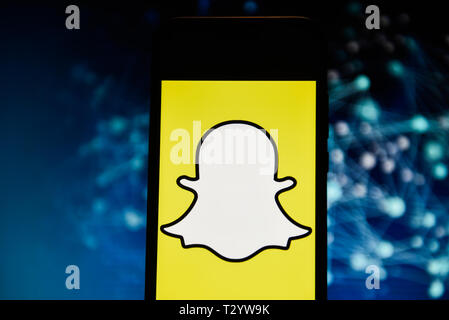 In diesem Foto Illustration eine Snapchat logo gesehen auf einem Smartphone angezeigt. Stockfoto