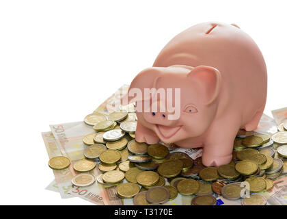 Sparschwein mit Banknoten und Münzen Stockfoto