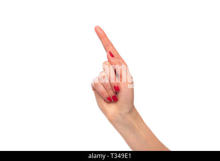 Weibliche Finger zeigen auf weißem Hintergrund Stockfoto