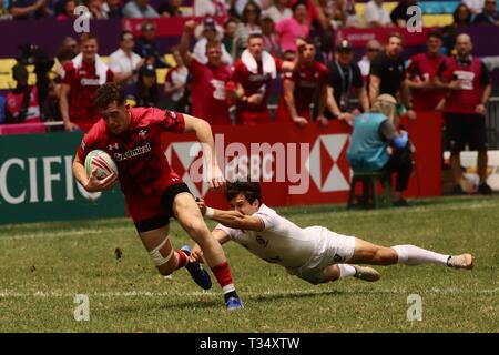 Hongkong, China. 6 Apr, 2019. Uns Rugby Team verloren Männer Qualifikationsspiel gegen Wales zählenden 19-21 am zweiten Tag, HK Hong Kong Sevens 2019. ZUMA/Liau Chung-ren Credit: Liau Chung-ren/ZUMA Draht/Alamy leben Nachrichten Stockfoto