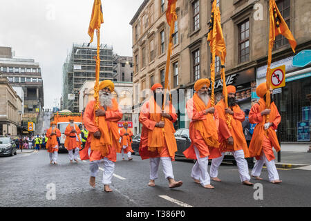 Glasgow, Schottland, Großbritannien. 7. April 2019. Sikhs in Glasgow feiert das Festival der Vaisakhi (oder Baisakhi) mit einem bunten Nagar Kirtan Parade aound der Stadt vier oder Sikh Sikh Tempel. Credit: Kay Roxby/Alamy leben Nachrichten Stockfoto