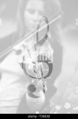 Geiger und Violinschlüssel. Musik Konzept Stockfoto