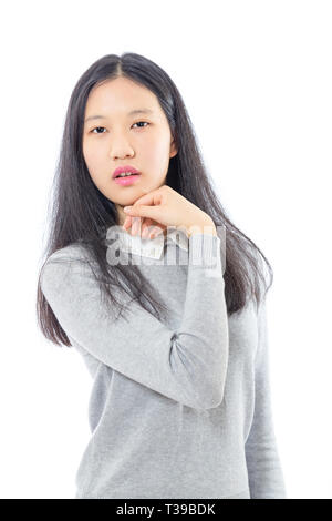 Teenage asiatischen High School Mädchen mit Kinn auf der Hand Stockfoto