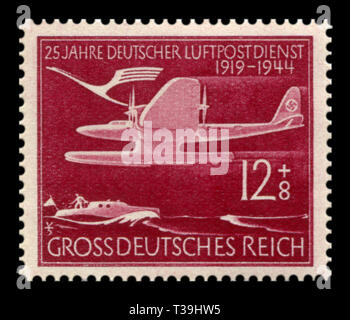 Deutsche historische Stempel: 25. Jahrestag der Deutschen Post Air Service. Wasserflugzeug Blohm & Voss HA 139 fliegen über dem Wasser, Flugpost, 1944, DR Stockfoto