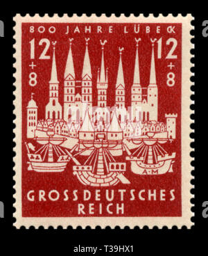 Deutsche historische Stempel: Blick auf die Stadt Lübeck in 1500 ad, das 800jährige Jubiläum der Gründung der Hansestadt, Handelsschiffe, 1943 Stockfoto