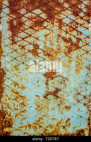Textur des alten rostigen Metall, weiß lackiert, Orange von Rost wurde. Die vertikale Struktur der rostigen Muster auf Farbe in Form von Stahl net Stockfoto
