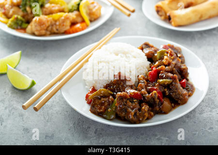 Tangerine Rindfleisch mit Reis Stockfoto