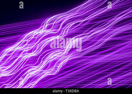Beweglichen Neonlichter abstrakte Textur. Lange Belichtung geschossen Stockfoto