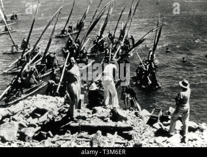 Regisseur Orson Welles während vier Männer Nehmen auf einem Floß, 1986 Stockfoto
