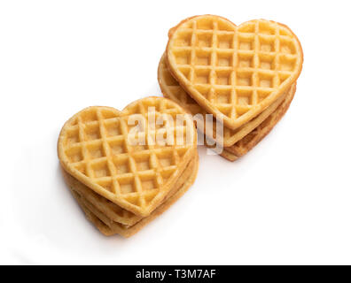 Stapel von herzförmige Waffeln isoliert auf weißem Stockfoto