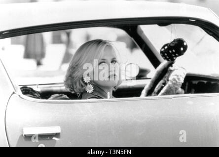 Nicht identifizierte blonde Schauspielerin Autofahren, 1990 s Stockfoto