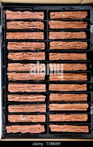 Ein Kunststoff Fach von Cadbury Mini Flake bars Stockfoto