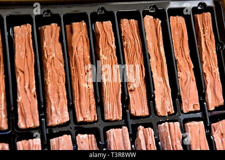 Ein Kunststoff Fach von Cadbury Mini Flake bars Stockfoto