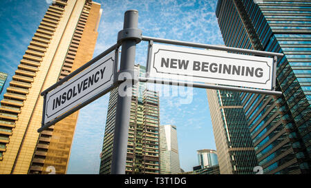 Street Sign neuer Anfang gegen Insolvenz Stockfoto