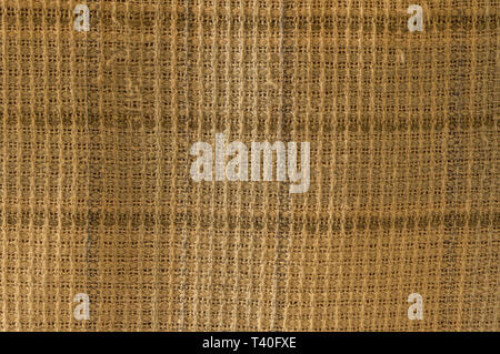 Nahaufnahme von Zerknitterten Stoff Textur, Leinen Background der leichte Stoff mit Kreuz und Wave. Natürliche Leinwand Muster Hintergrund. Studio sh Stockfoto