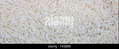 Thai Reis, Jasmin trockenen Samen full frame Hintergrund, Banner. Nahaufnahme, Ansicht von oben Stockfoto