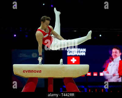 Birmingham, England, UK. 23. März, 2019. Die Schweiz Christian Baumann in Aktion während der Männer Pferd Wettbewerb, während der 2019 Gymnasti Stockfoto