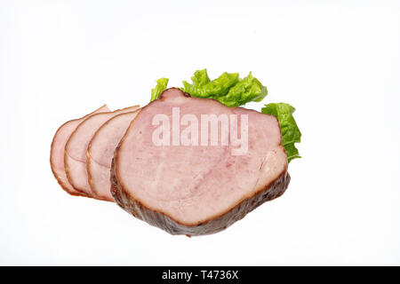 Geräuchertes Rindfleisch und Grün auf einem isolierten studio Hintergrund Stockfoto