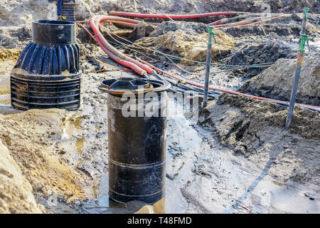 Reparatur und Austausch von u-Kommunikation und Rohre auf der Stadt. Stockfoto