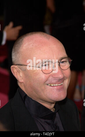 LOS ANGELES, Ca. 29. Februar 2004: Phil Collins & Familie auf der 76. jährlichen Academy Awards in Hollywood. Stockfoto