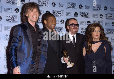 LOS ANGELES, Ca. Januar 16, 2005: Mick Jagger (links), Usher, Dave Stewart & Lisa Marie Presley auf der 62. jährlichen Golden Globe Awards im Beverly Hilton Hotel. Stockfoto