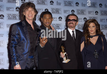 LOS ANGELES, Ca. Januar 16, 2005: Mick Jagger (links), Usher, Dave Stewart & Lisa Marie Presley auf der 62. jährlichen Golden Globe Awards im Beverly Hilton Hotel. Stockfoto