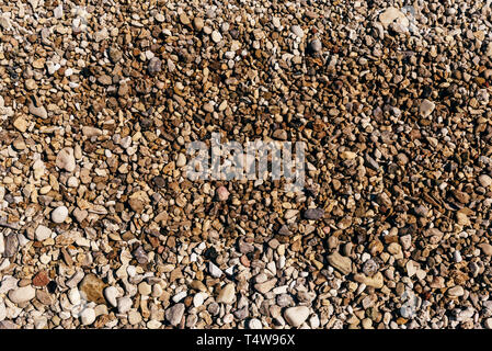 Hintergrund des Flusses Kieselsteine am Strand Stockfoto