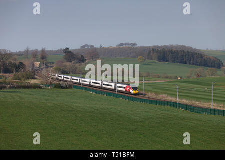 Virgin Trains Pendolino train auf der West Coast Main Line in Cumbria, Southwaite. Stockfoto