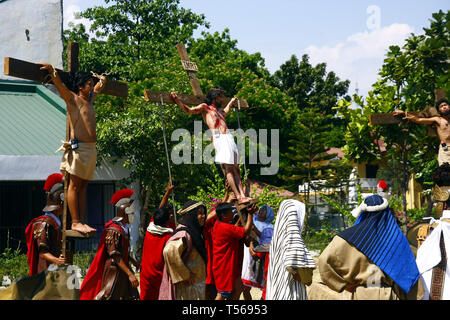 CAINTA, Rizal, Philippinen - 19. APRIL 2019: Reenactment der Passion Christi. Am Karfreitag als Teil der Feier der Heiligen Woche. Stockfoto