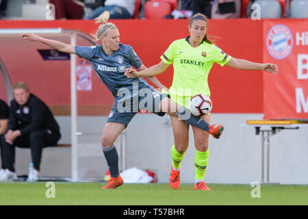 21. April 2019, Bayern, München: Fußball, Frauen: Champions League, FC Bayern München - FC Barcelona, K.o.-Runde, Halbfinale, Hinspiel auf der FC Bayern Campus. Kristin Demann vom FC Bayern München (l) und Alexia Putellas aus Barcelona im Duell um den Ball. Foto: Matthias Balk/dpa Stockfoto